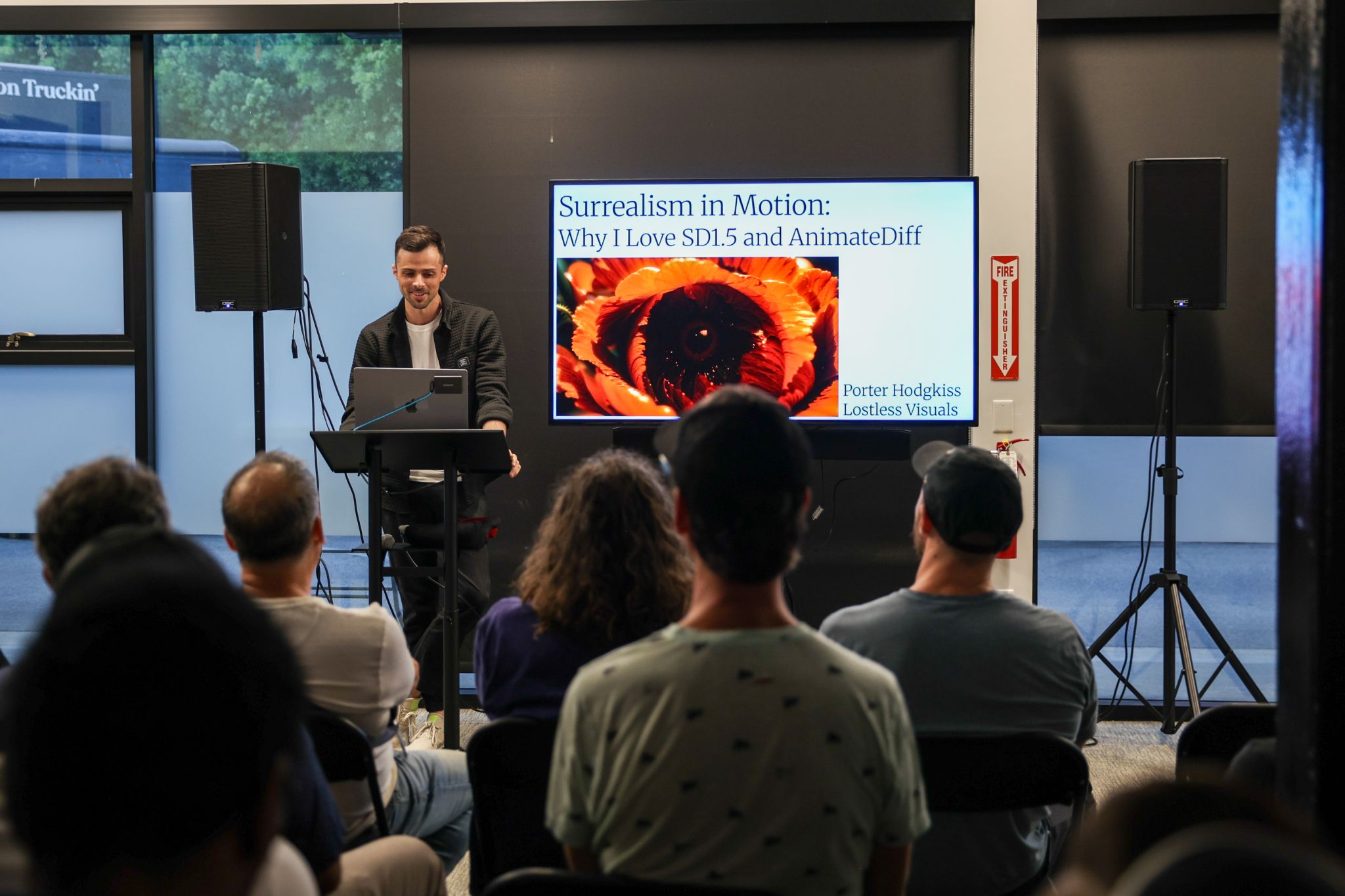 Porter speaking about his visuals process at a live talk
